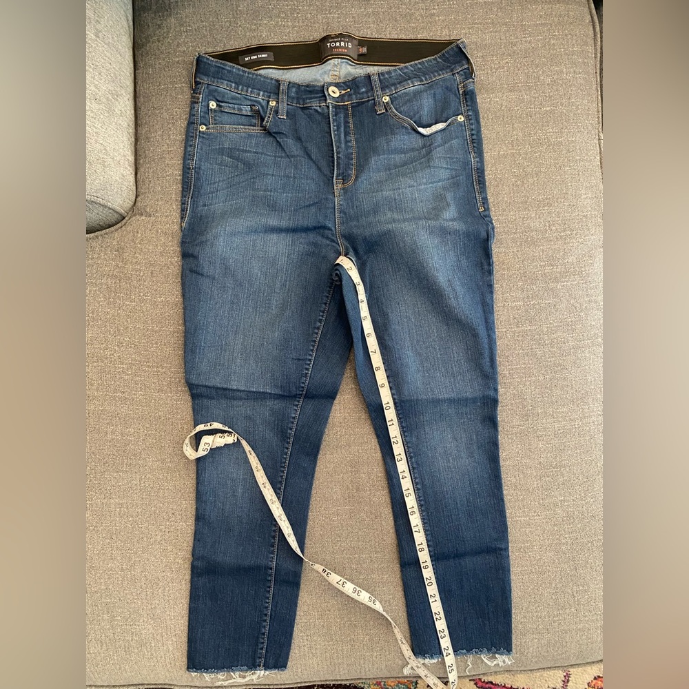 Shy High Skinny jeans. Clean front raw hem.